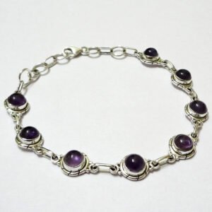 Sterling silver amethyst bracelet with handcrafted gemstone settings and adjustable lobster clasp.