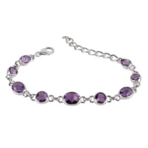 Sterling silver amethyst bracelet featuring faceted purple gemstones and an adjustable lobster clasp