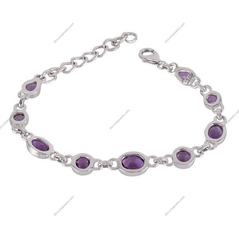 Sterling silver amethyst bracelet featuring faceted purple gemstones and an adjustable lobster clasp