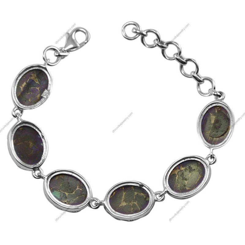 Sterling silver purple turquoise bracelet with oval gemstones and adjustable clasp