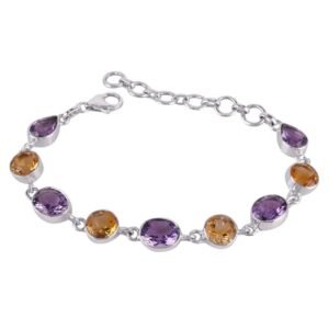 Sterling silver amethyst and citrine bracelet with adjustable clasp and handcrafted gemstone settings.