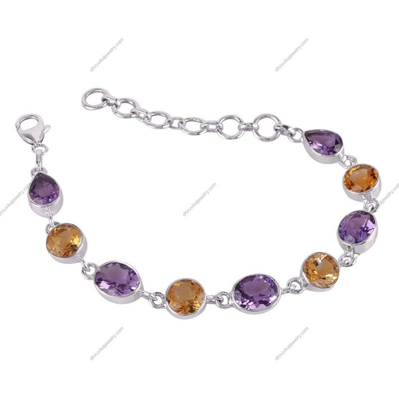 Sterling silver amethyst and citrine bracelet with adjustable clasp and handcrafted gemstone settings.