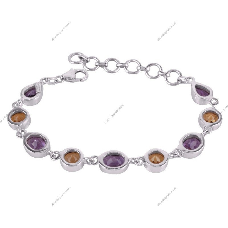 Sterling silver amethyst and citrine bracelet with adjustable clasp and handcrafted gemstone settings.