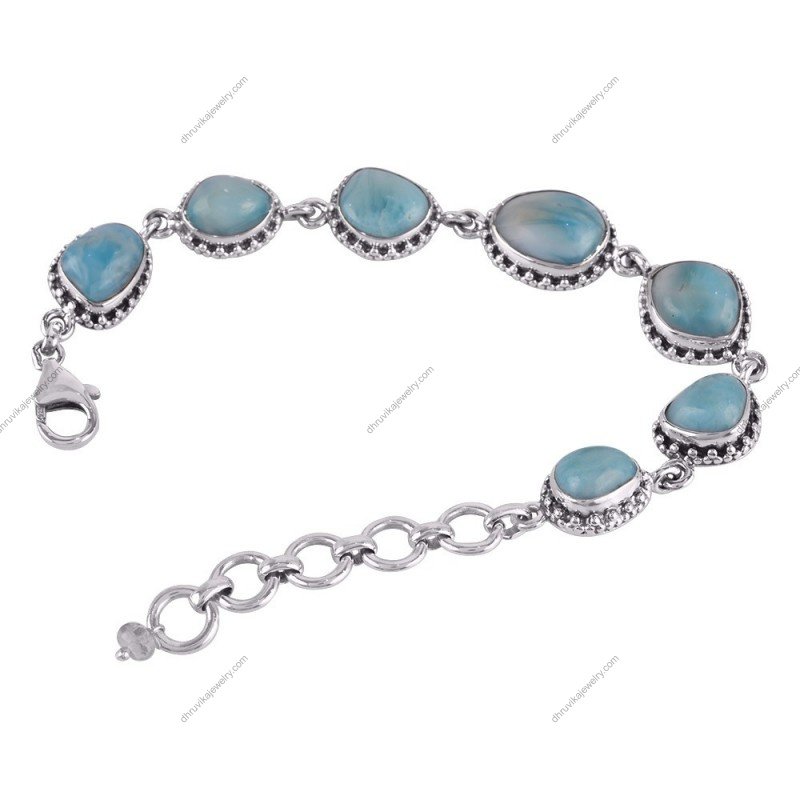 Sterling silver Larimar bracelet with ocean-blue gemstones and handcrafted silver detailing