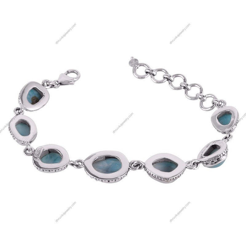 Sterling silver Larimar bracelet with ocean-blue gemstones and handcrafted silver detailing