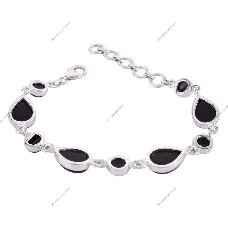 Sterling silver black onyx bracelet with bezel-set gemstones, handcrafted for elegance and durability
