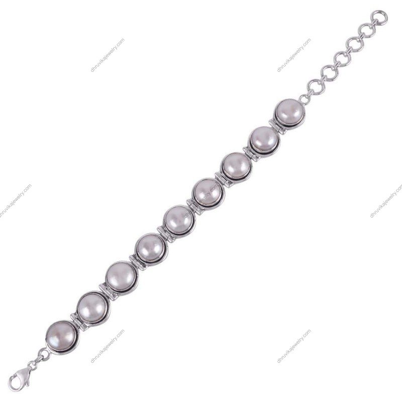 Sterling silver pearl bracelet featuring handcrafted freshwater pearls and polished silver setting