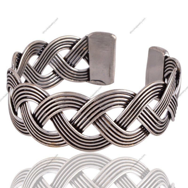 Handcrafted sterling silver woven cuff bracelet with intricate braided design