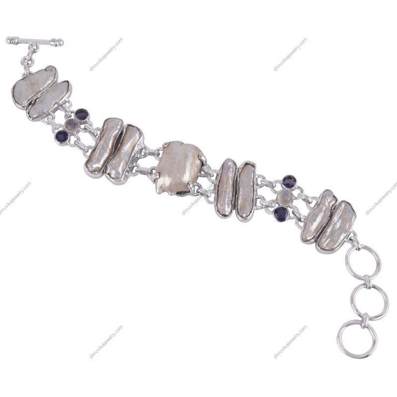 Handcrafted silver Biwa pearl bracelet with unique pearl shapes and gemstone accents