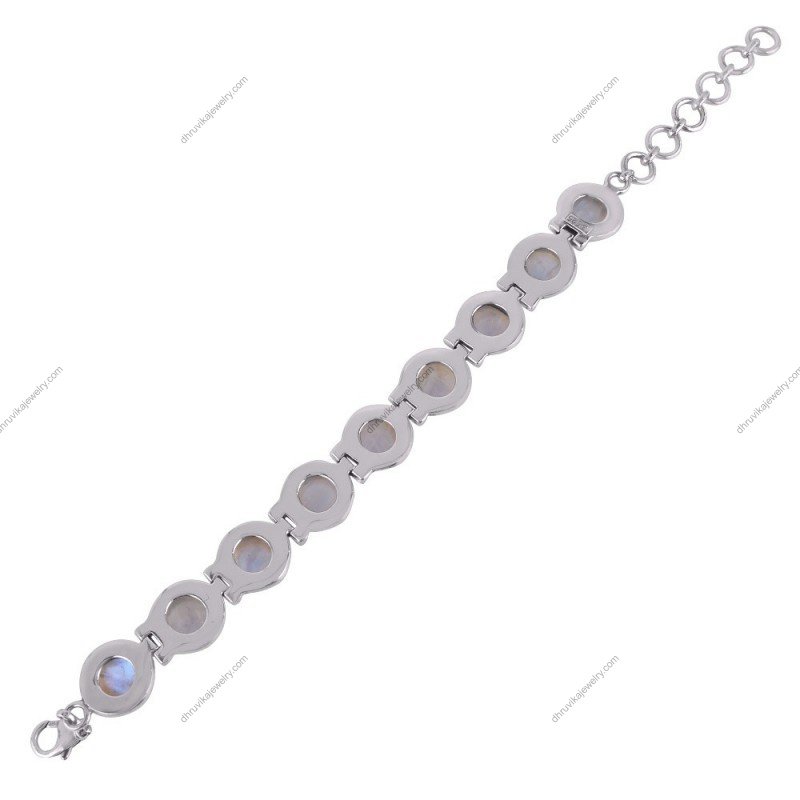 Elegant sterling silver moonstone bracelet featuring handcrafted bezel-set gemstones.