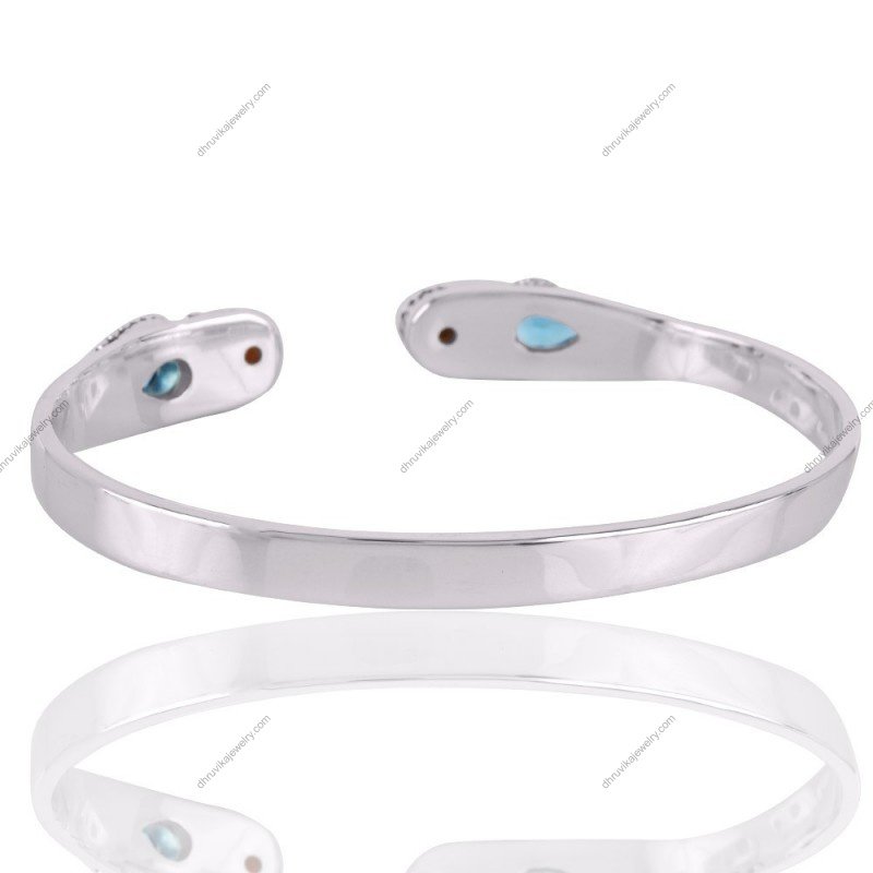 Sterling silver cuff bracelet with blue topaz and pearl gemstones, handcrafted boho jewelry