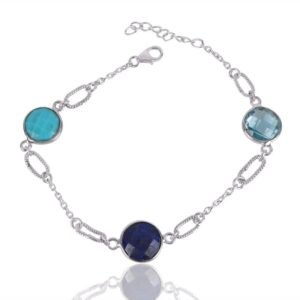 Sterling silver bracelet with lapis, turquoise, and blue topaz gemstones, handcrafted and adjustable for a perfect fit.