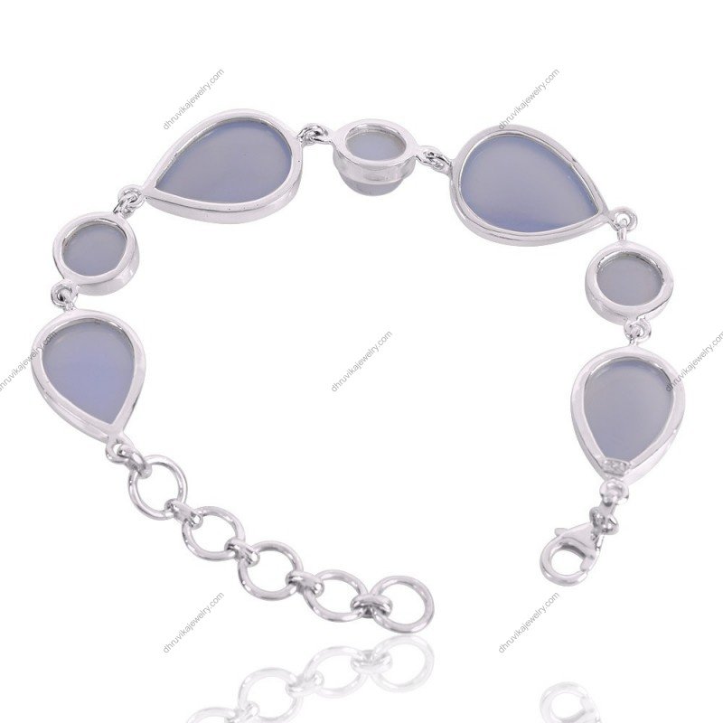 Handcrafted sterling silver chalcedony bracelet with natural blue gemstones, elegantly designed for a timeless look.