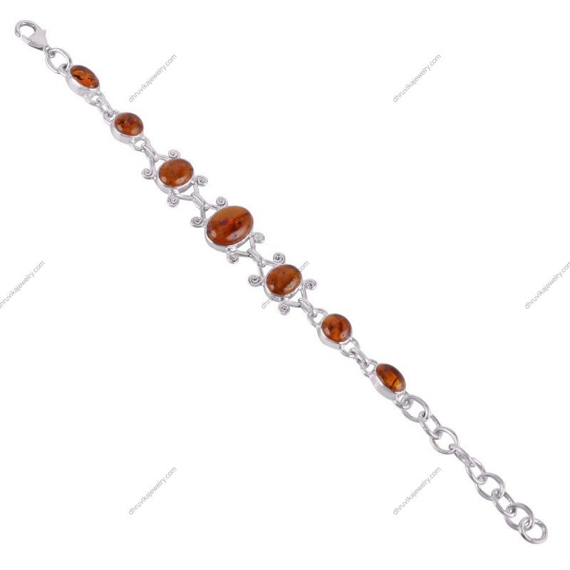 Sterling silver amber bracelet with handcrafted filigree and genuine Baltic amber gemstones