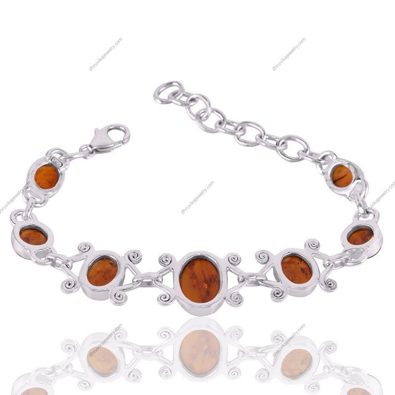 Sterling silver amber bracelet with handcrafted filigree and genuine Baltic amber gemstones