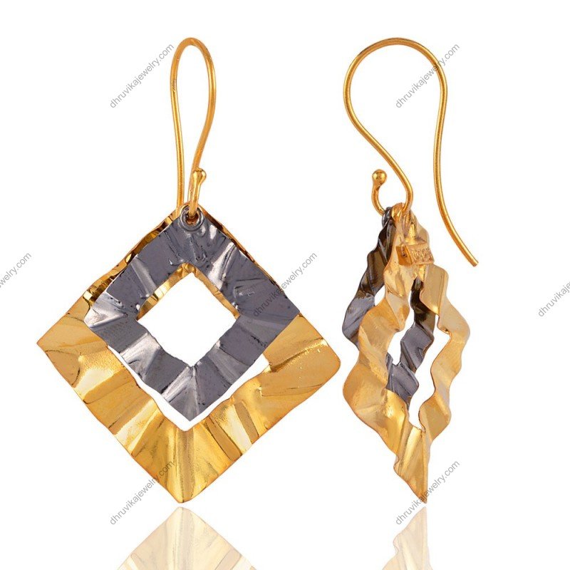 Silver and gold-tone geometric drop earrings with hammered texture and diamond-shaped design view1
