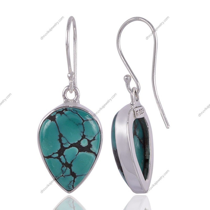 Handcrafted silver turquoise drop earrings in sterling silver with teardrop gemstone design view1