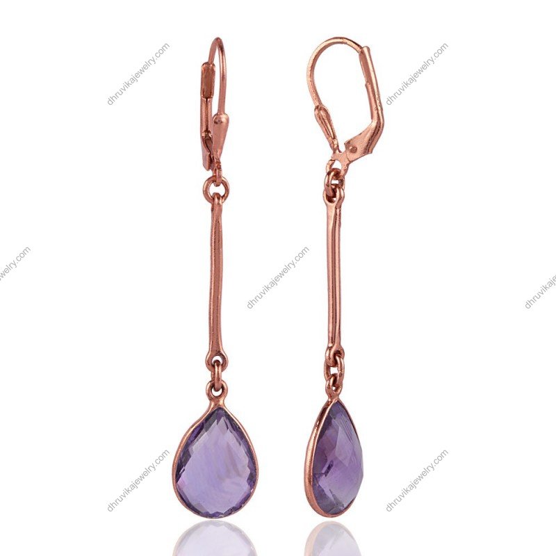 Elegant silver amethyst dangle earrings with pear-shaped purple gemstones in sterling silver setting view1