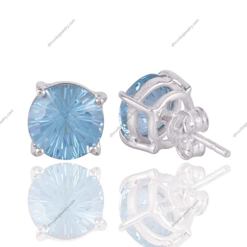 Sterling silver blue topaz stud earrings with faceted gemstone in prong setting view1
