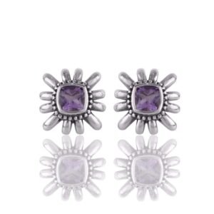 Sterling silver amethyst stud earrings with sunburst design and cushion-cut purple gemstone main view