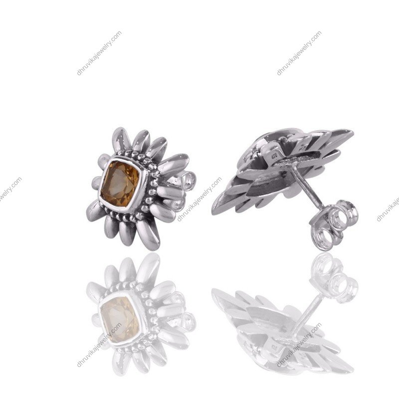 Sterling silver citrine earrings with handcrafted sunburst design and push-back closure. view1