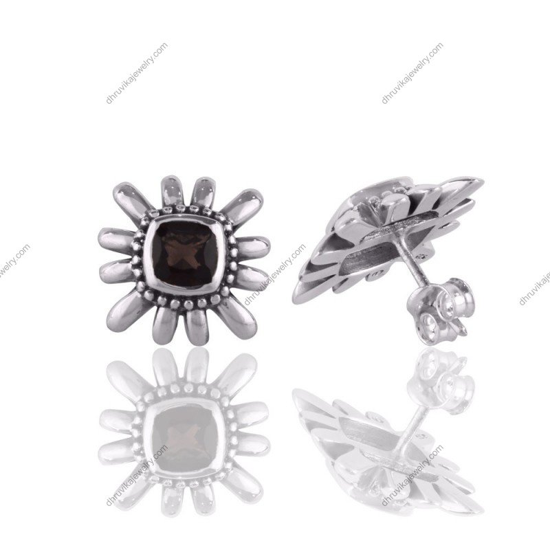 Silver sunburst stud earrings with black stone accent, sterling silver jewelry view1