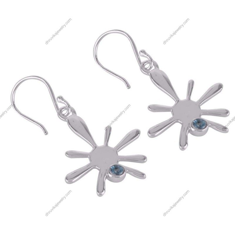 Sterling silver starburst earrings with blue gemstone accent, artistic dangle earrings alternate image