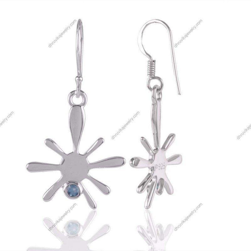 Sterling silver starburst earrings with blue gemstone accent, artistic dangle earrings view1