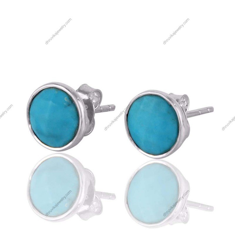 Sterling silver turquoise stud earrings with round-cut blue gemstones, elegant minimalist design. alternate image