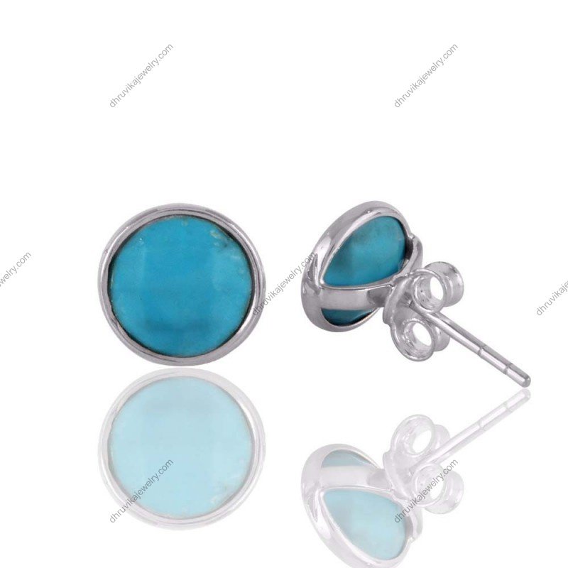 Sterling silver turquoise stud earrings with round-cut blue gemstones, elegant minimalist design. view1