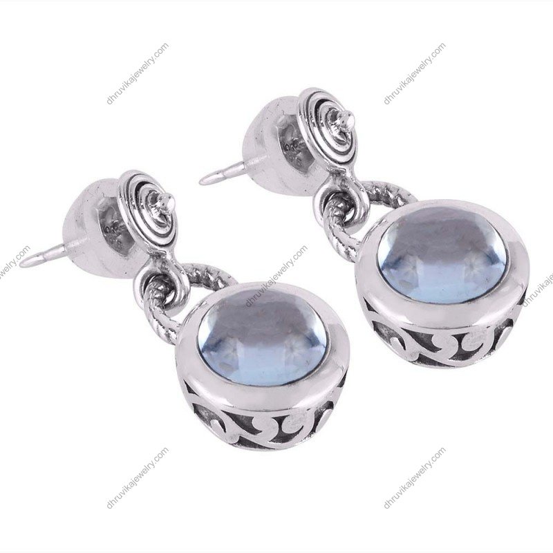 Sterling silver blue topaz dangle earrings featuring round gemstone in polished metal setting alternate image