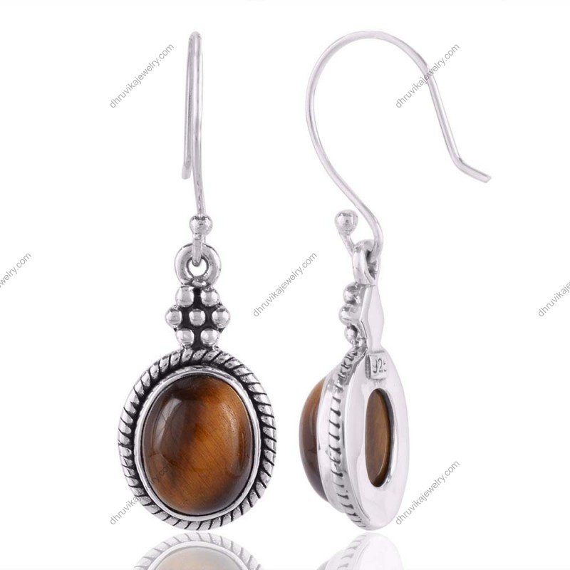 Sterling silver tiger’s eye dangle earrings with intricate detailing and boho charm view1