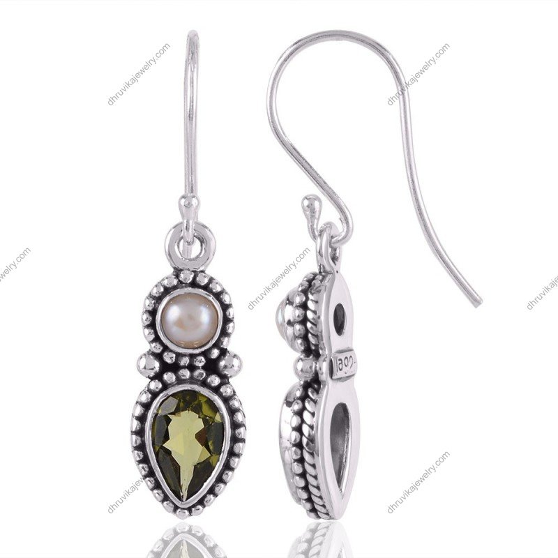 Sterling silver pearl and peridot earrings with vintage dangle design view1