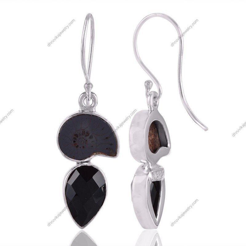 Sterling silver ammonite fossil earrings with black onyx gemstones in dangle design. view1