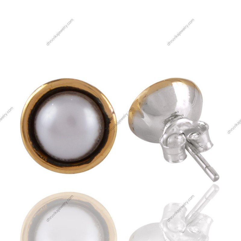 Silver pearl stud earrings with gold-plated accent on sterling silver base view1