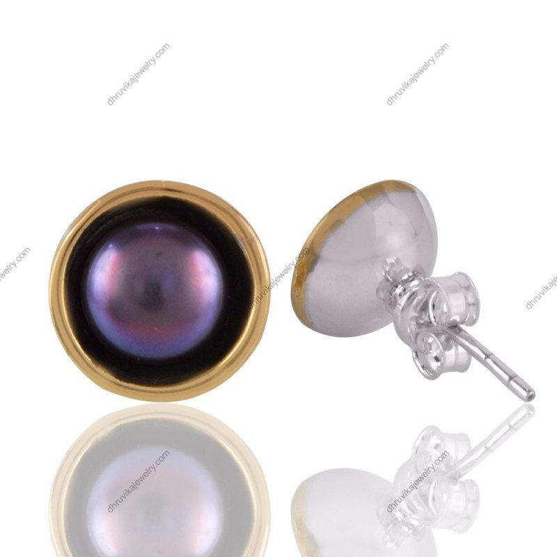 Silver pearl stud earrings with black pearls and gold accents, elegant and timeless design view1