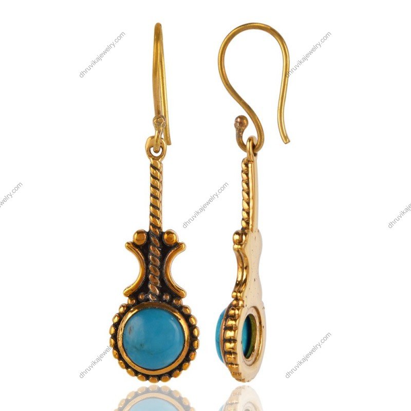 Vintage silver and turquoise dangle earrings with handcrafted detailing view1