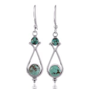 Sterling silver turquoise dangle earrings with handcrafted detailing and bohemian design main view