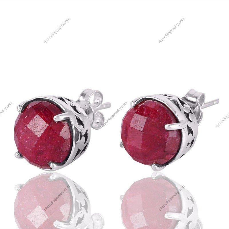Sterling silver ruby stud earrings with faceted stones in a classic prong setting alternate image