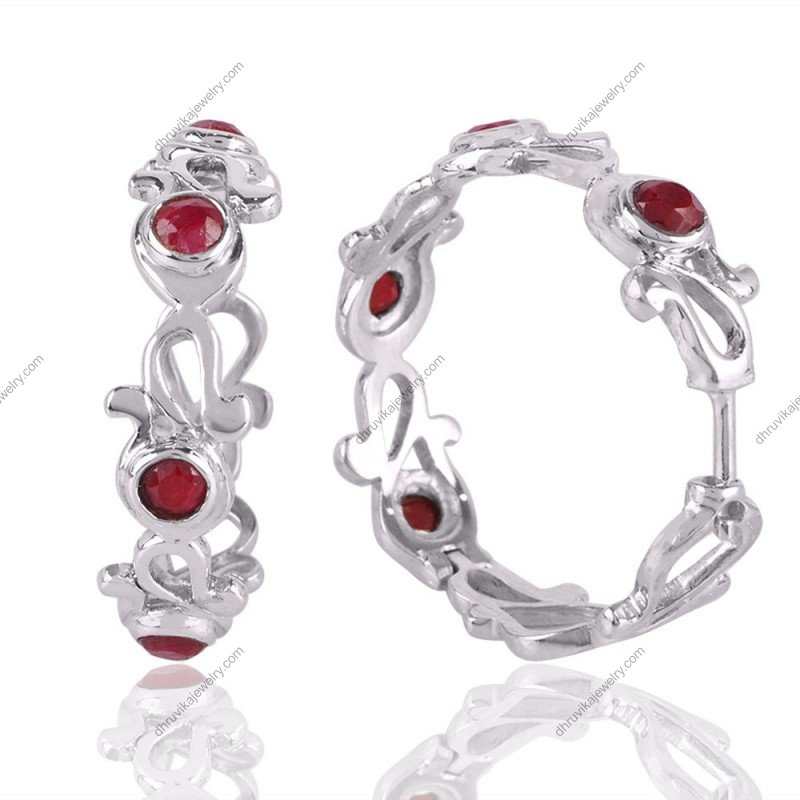 Sterling silver ruby hoop earrings with intricate scrollwork and red gemstone accents alternate image
