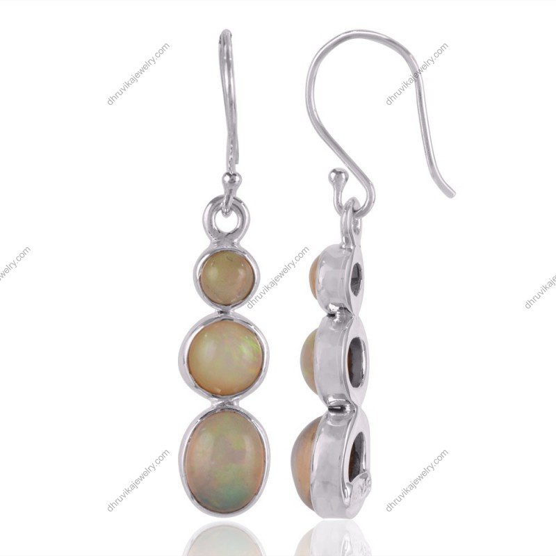 Handcrafted silver opal dangle earrings with sterling silver setting and luminous gemstone design view1