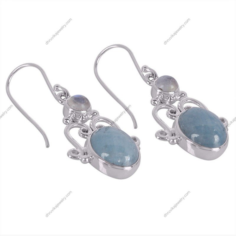 Silver dangle earrings featuring aquamarine and moonstone with intricate scrollwork alternate image