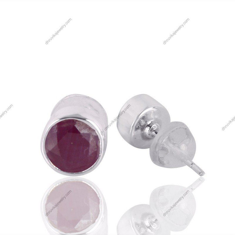 Sterling silver ruby stud earrings with faceted red gemstones, classic minimal jewelry design alternate image