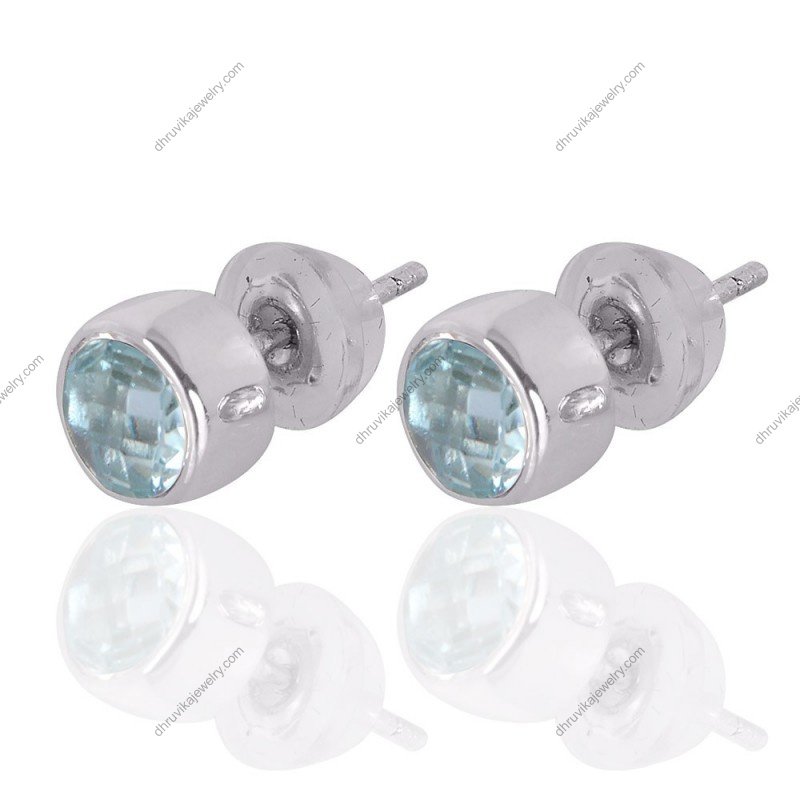 Sterling silver blue topaz stud earrings with faceted round gemstones view1