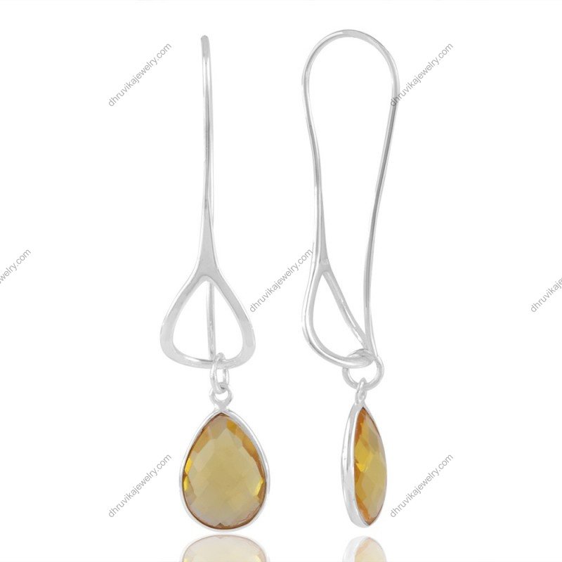Sterling silver citrine dangle earrings with pear-shaped gemstones in elegant drop design view1