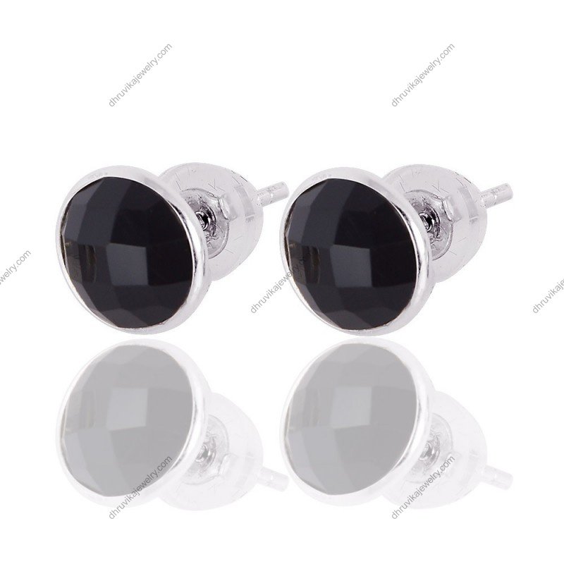 Silver black onyx stud earrings in sterling silver with a minimalist bezel setting. alternate image
