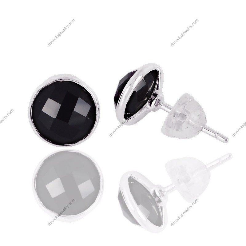 Silver black onyx stud earrings in sterling silver with a minimalist bezel setting. view1