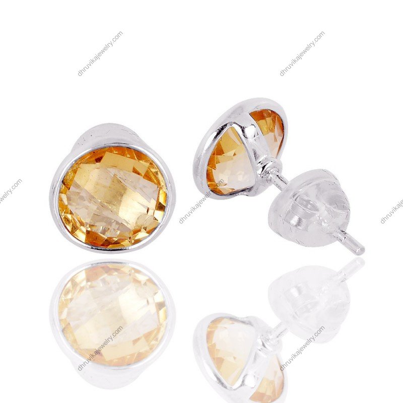 Silver citrine stud earrings with round faceted gemstones in sterling silver setting view1