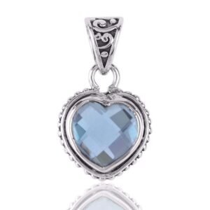 Sterling silver blue topaz heart pendant with intricate filigree detailing main view