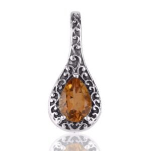 Vintage citrine pendant in sterling silver with filigree detailing, featuring pear-shaped gemstone. main view